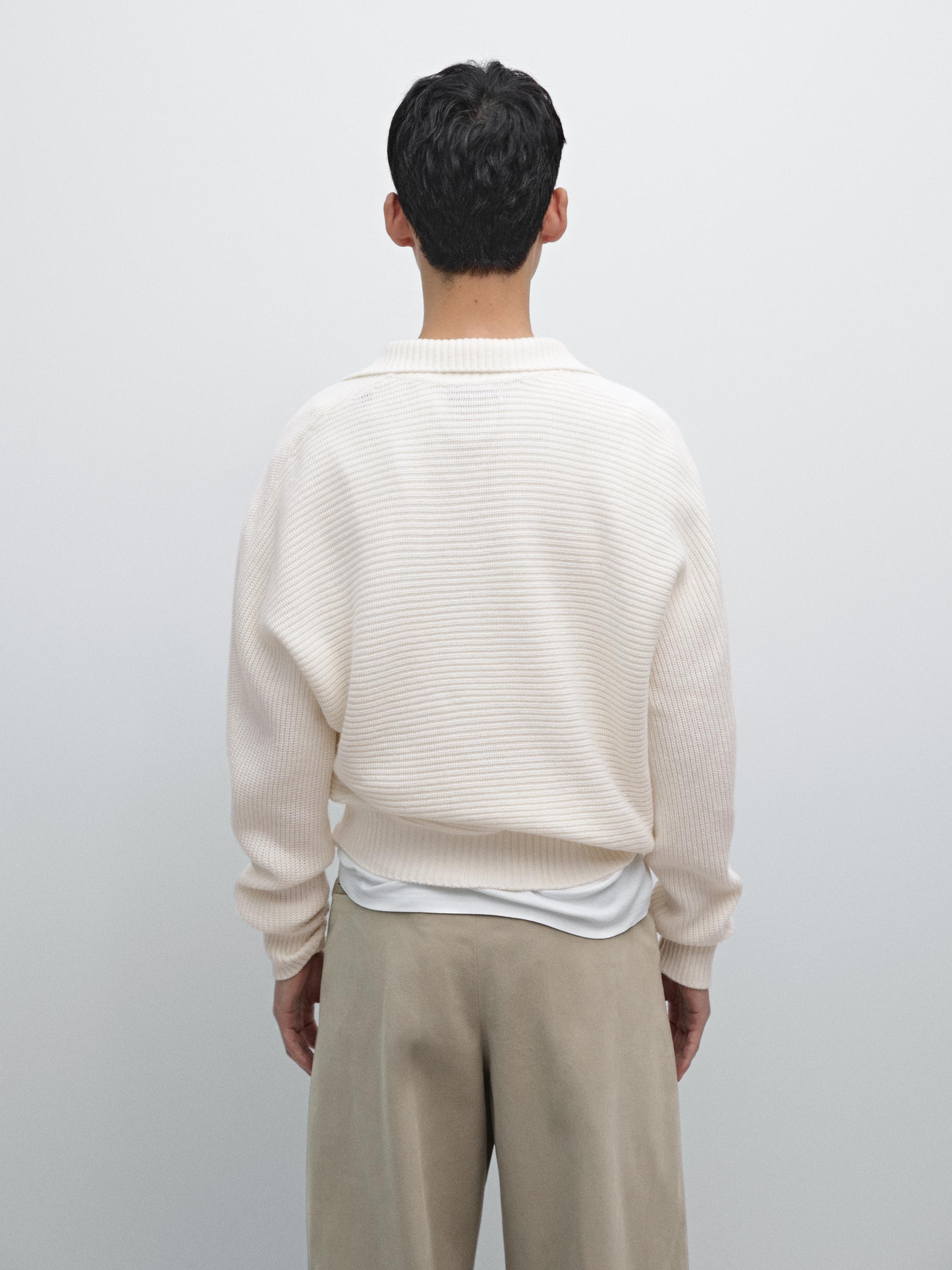 Knit sweater with mock button neck